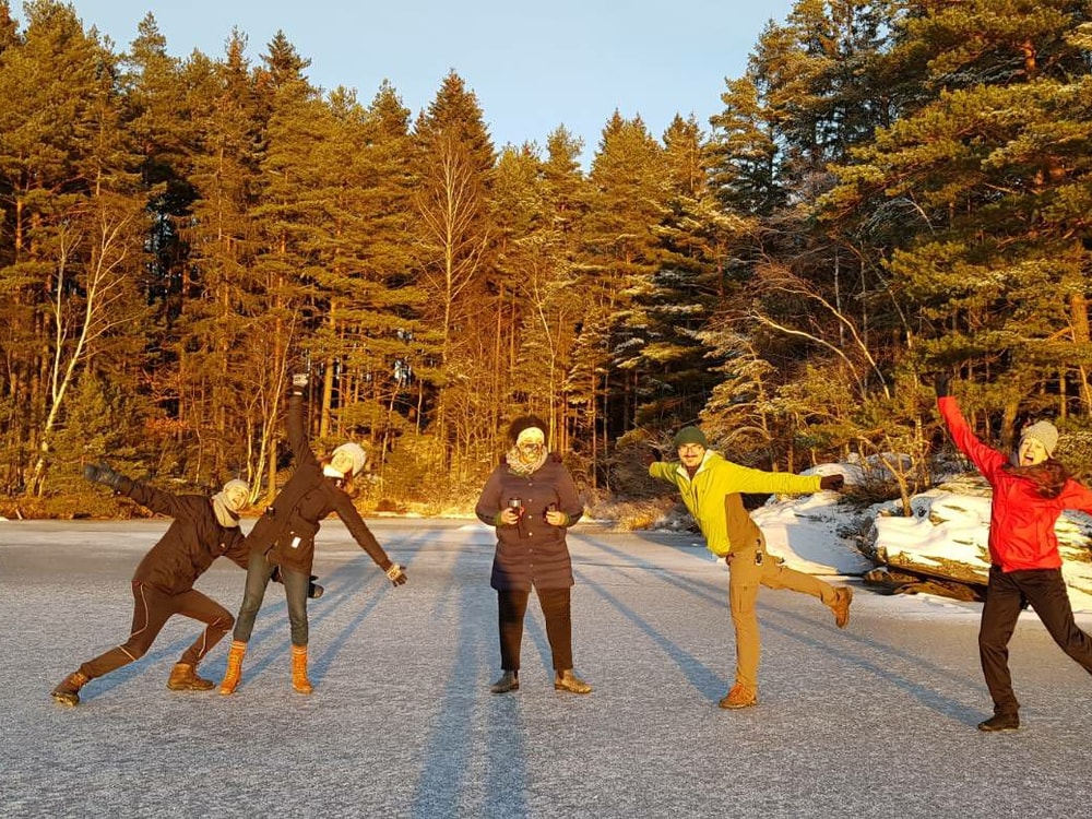 Some of the participants enjoying a sunny moment on the frozen lake